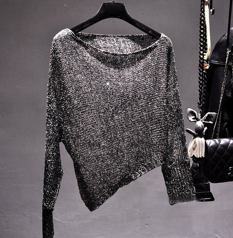 BLUSA ASIMÉTRICA DE LENTEJUELAS