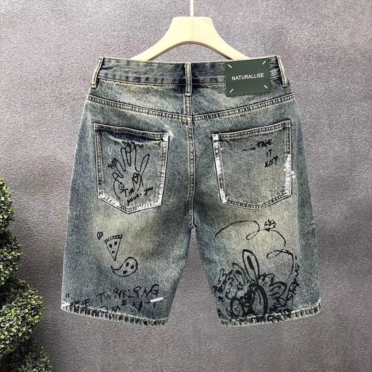 PANTALONES CORTOS VAQUEROS CON ESTAMPADO ROGUE