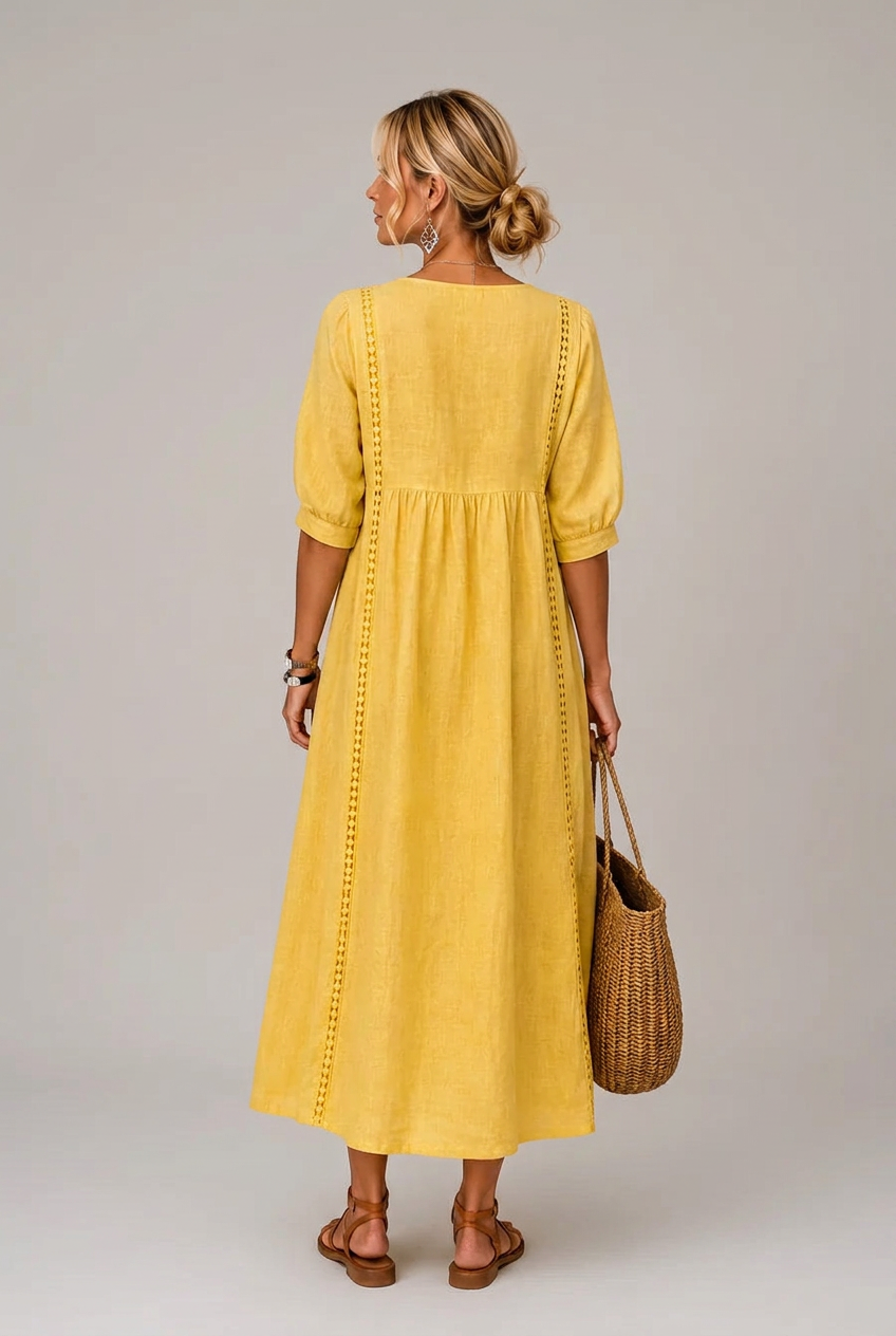 Santorini amarillo trasera con fondo gris cálido
